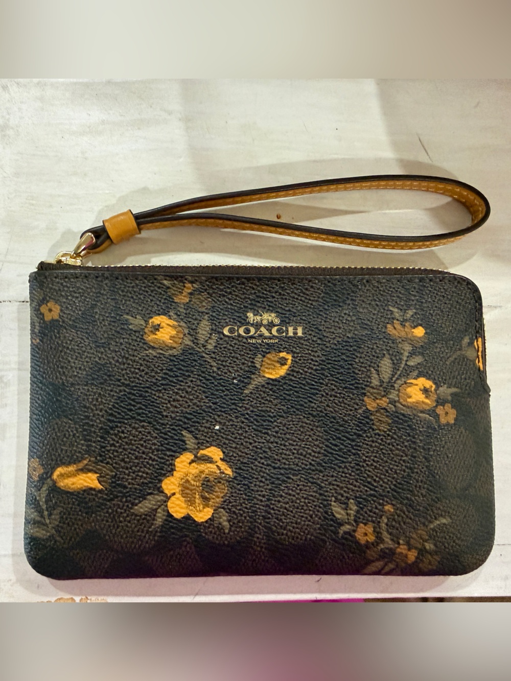 Coach Black Wristlet with Yellow Floral Print